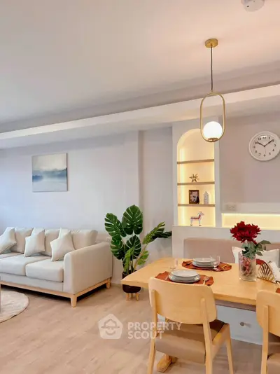 Stylish living room with cozy dining area and modern decor