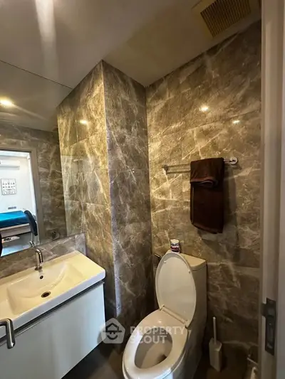 Luxurious marble bathroom with modern fixtures and elegant design