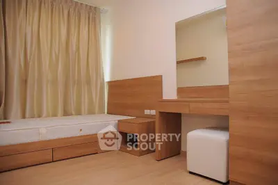 Modern bedroom with wooden furniture and natural light