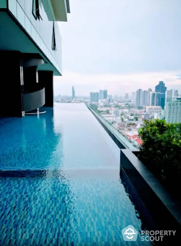 Luxurious rooftop infinity pool with stunning city skyline view