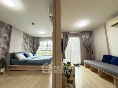 Modern bedroom and living room with stylish decor and natural light