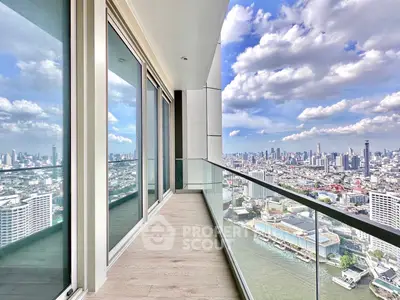 Stunning high-rise balcony with panoramic city skyline and river views, perfect for urban living.