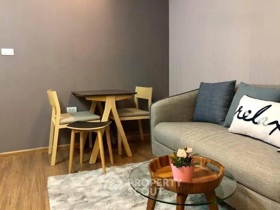 Cozy living room with modern furniture and stylish decor, perfect for relaxation.