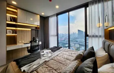 Luxurious bedroom with stunning city view and modern decor