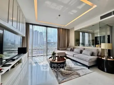 Luxurious modern living room with city view, elegant decor, and natural light.