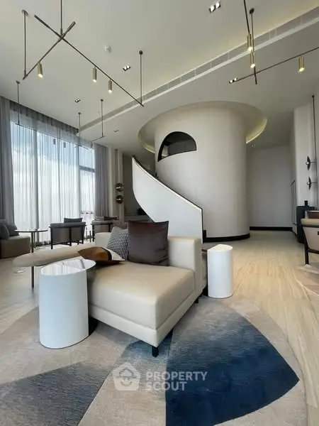 Luxurious modern living room with elegant spiral staircase and stylish furniture