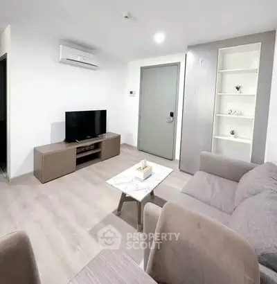 Modern living room with sleek furniture and minimalist decor