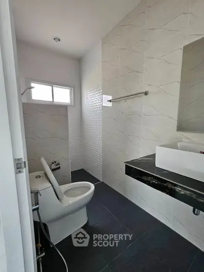 Modern bathroom with sleek fixtures and stylish tile design