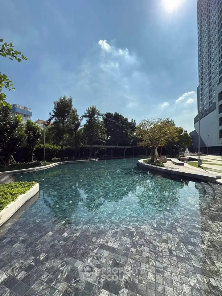 Luxurious residential pool with serene surroundings and modern architecture