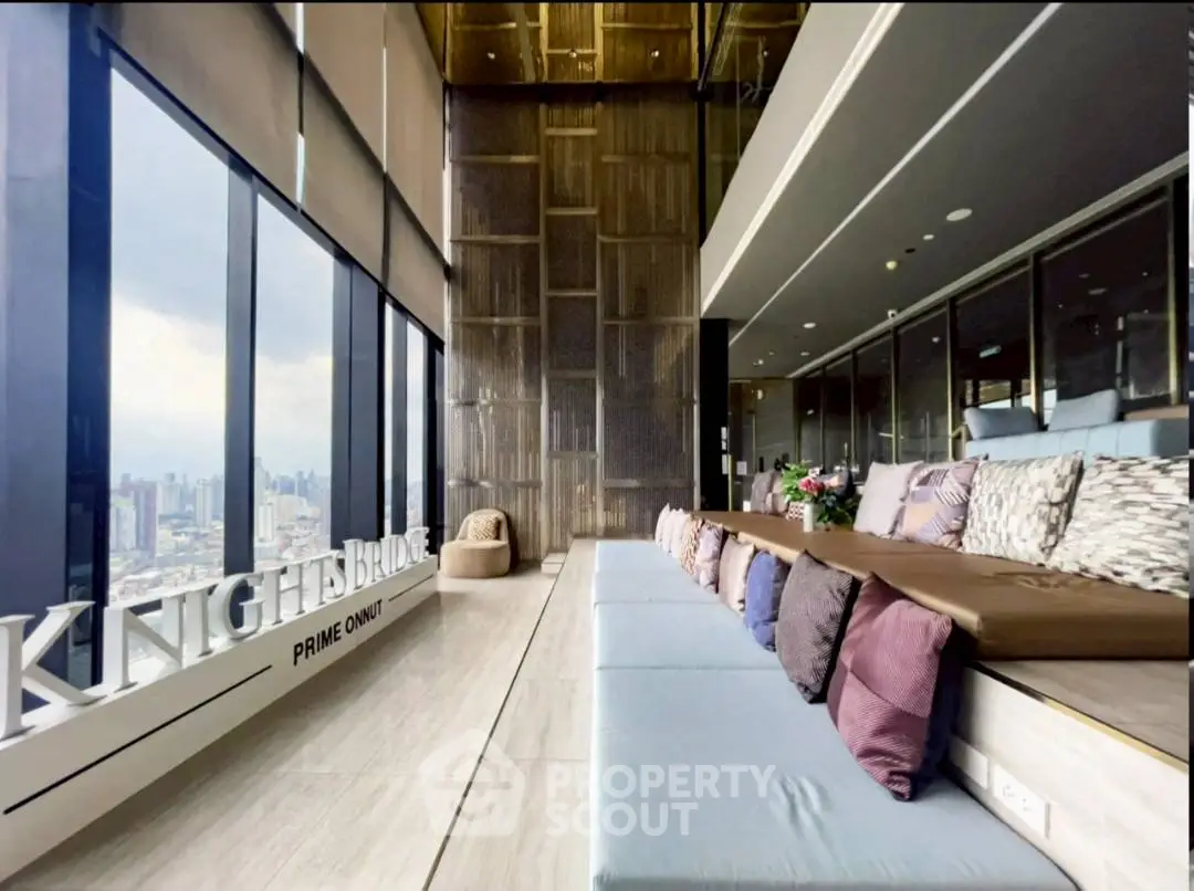 Luxurious high-rise living room with panoramic city view and elegant decor
