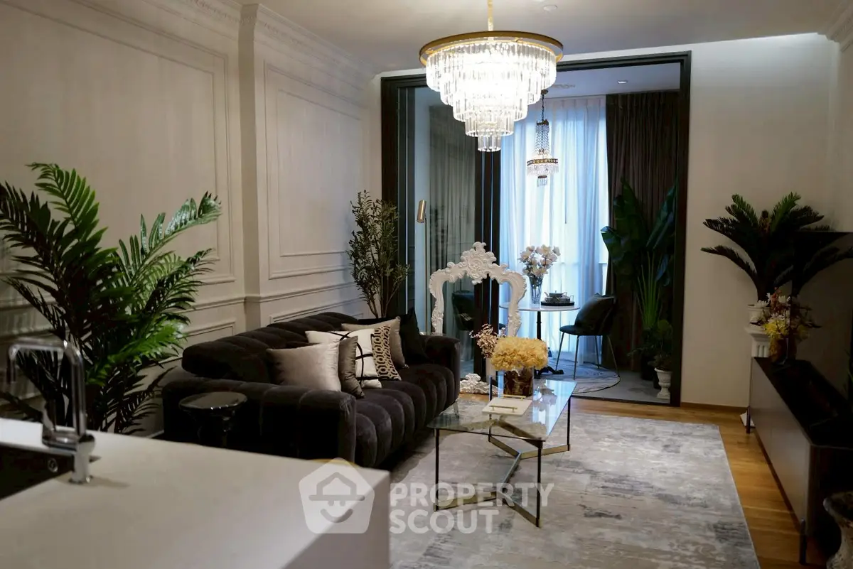 Luxurious living room with elegant chandelier and stylish decor