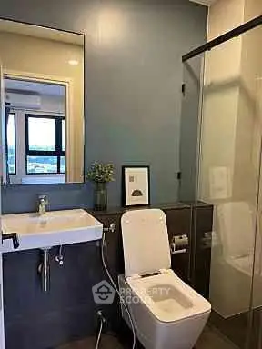 Modern bathroom with sleek design and glass shower enclosure