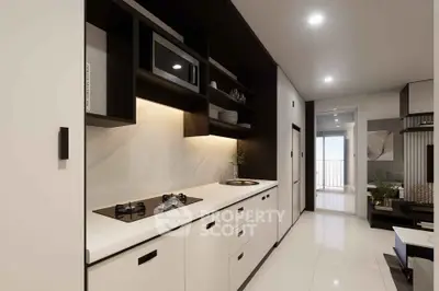 Modern kitchen with sleek design, gas stove, and open layout leading to living area.
