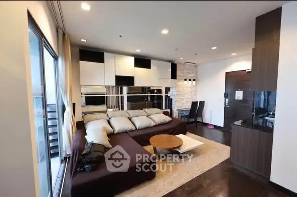 Modern living room with stylish furniture and open layout in a contemporary apartment.