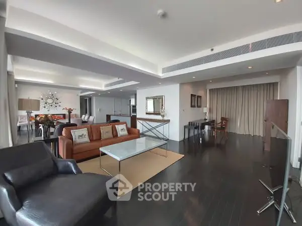 Spacious modern living room with elegant furniture and open layout