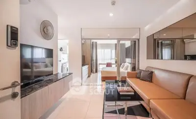 Modern living room with sleek design and cozy seating area