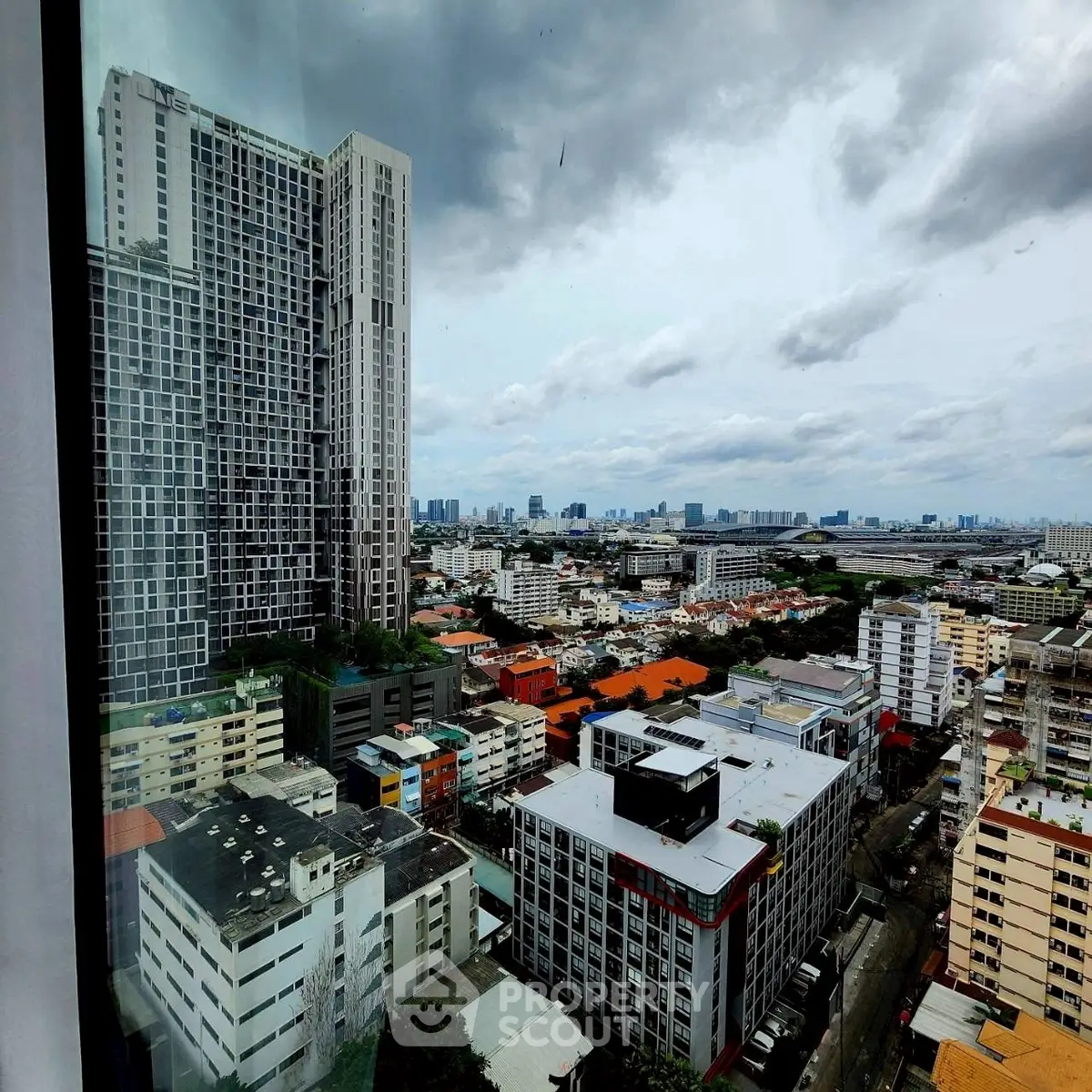 Stunning cityscape view from high-rise apartment window