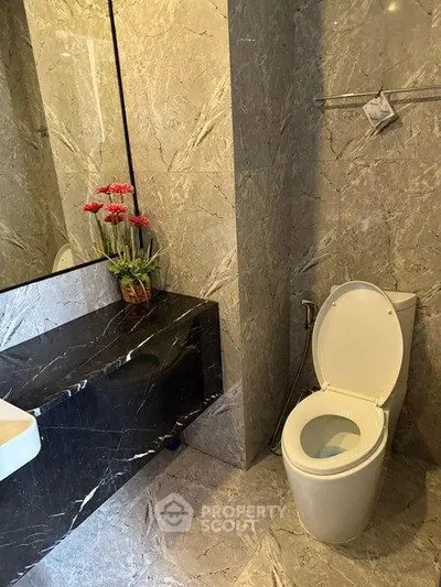 Luxurious marble bathroom with modern fixtures and elegant decor