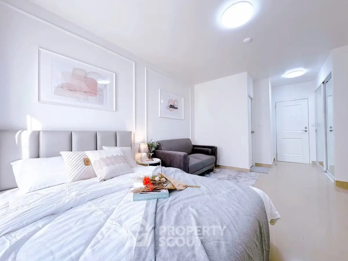 Bright and modern bedroom with stylish decor and cozy ambiance