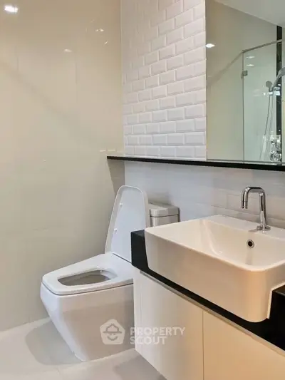 Modern bathroom with sleek fixtures and elegant tile design