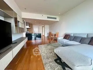 Spacious modern living room with sleek furniture and open layout