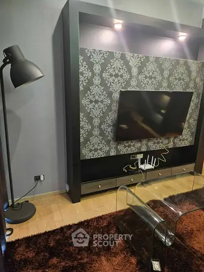Modern living room with stylish TV setup and elegant decor