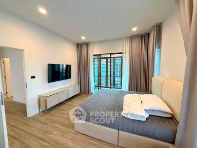 Modern bedroom with stylish decor and natural light