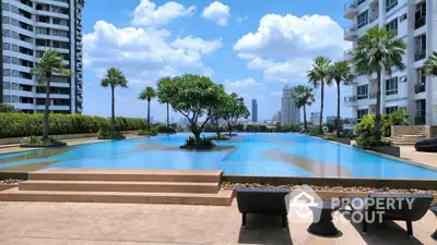 Luxurious rooftop pool with stunning city views and palm trees, perfect for relaxation and leisure.