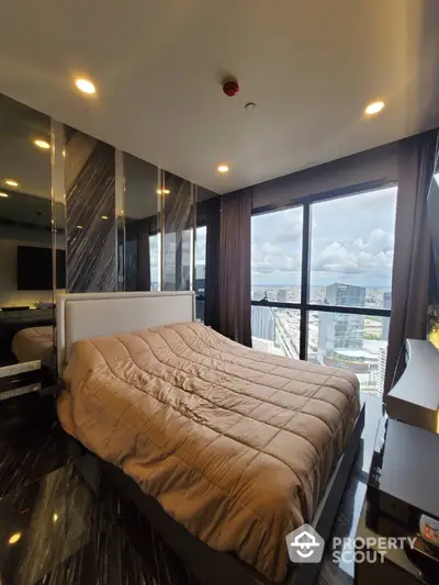 Luxurious bedroom with stunning city view and modern decor