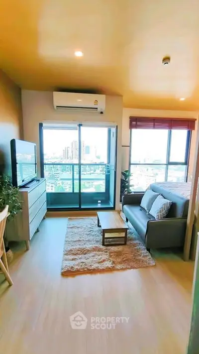 Modern living room with balcony view in urban apartment