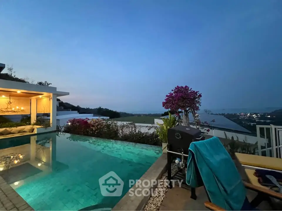 Luxurious rooftop pool with stunning panoramic view at sunset, perfect for relaxation and entertainment.