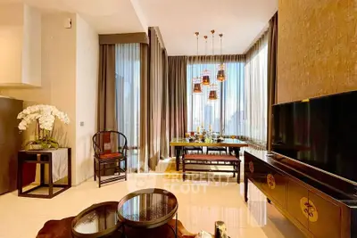 Luxurious living room with elegant decor and panoramic city views, featuring modern furniture and stylish lighting.