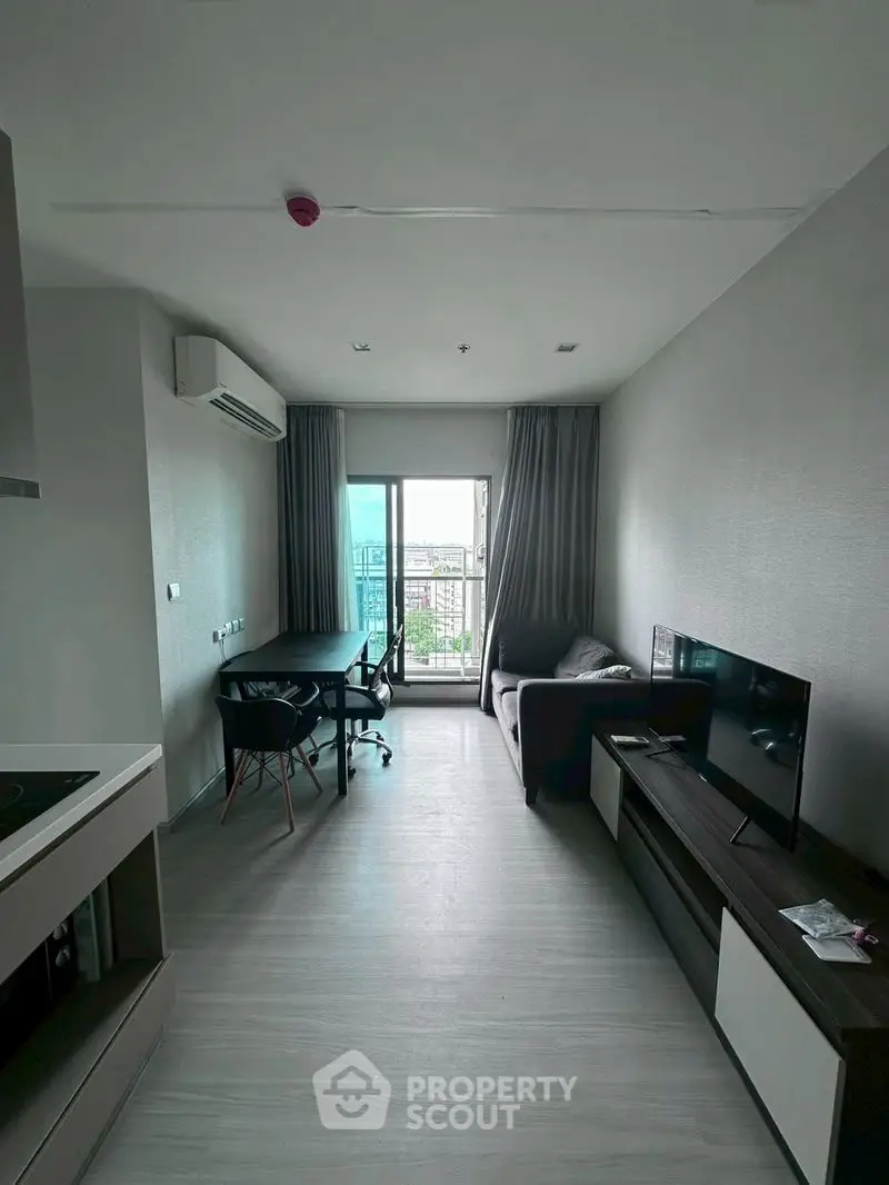 Modern living room with balcony view in a stylish apartment