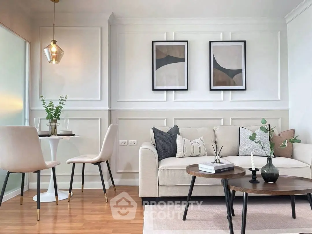 Stylish modern living room with elegant decor and cozy seating area.
