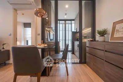 Modern kitchen with sleek design and open layout in a stylish apartment.