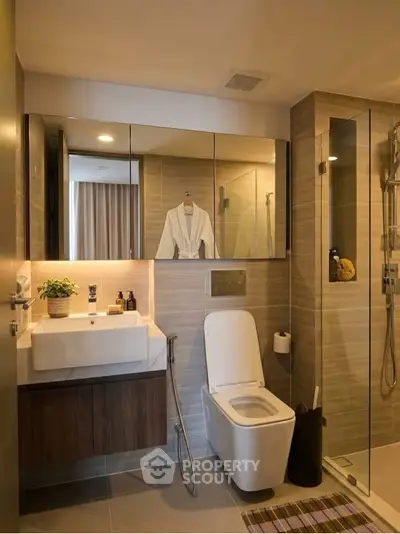 Luxurious modern bathroom with sleek fixtures and elegant lighting, perfect for relaxation and comfort.