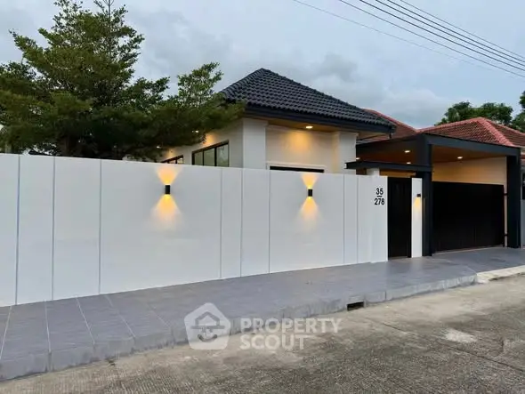 Modern house exterior with sleek design and ambient lighting