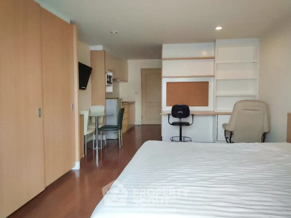 Spacious studio apartment with modern furnishings and open layout