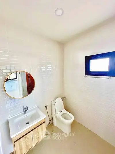 Modern bathroom with sleek fixtures and natural light