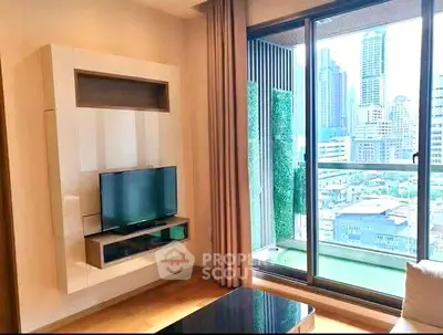 Modern living room with city view and sleek TV setup in high-rise apartment.