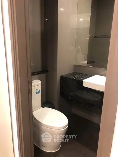 Modern bathroom with sleek fixtures and elegant design in a contemporary home.