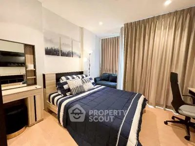 Cozy bedroom with modern decor and ample natural light