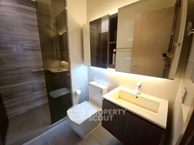 Modern bathroom with sleek fixtures and ambient lighting