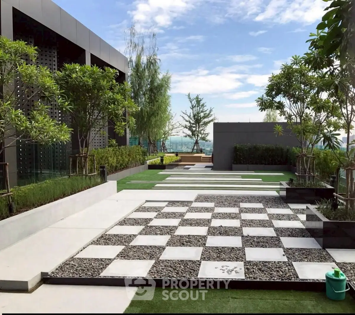 Luxurious rooftop garden with modern design and stunning city views, perfect for relaxation and entertainment.