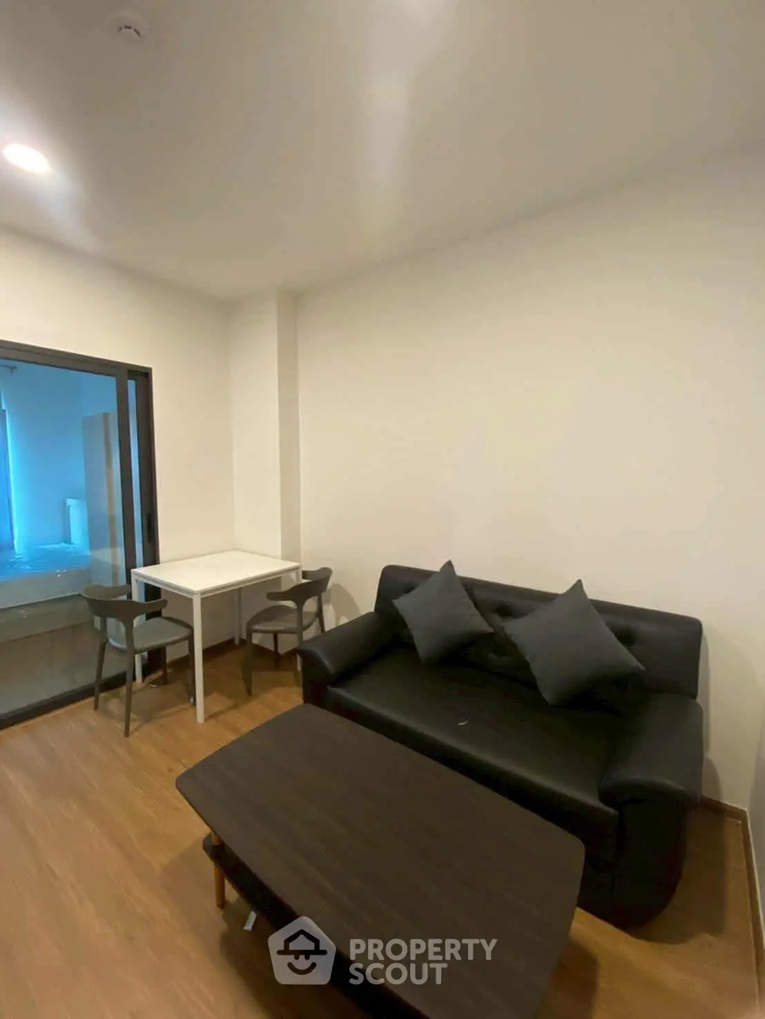 Cozy living room with modern furniture and wooden flooring