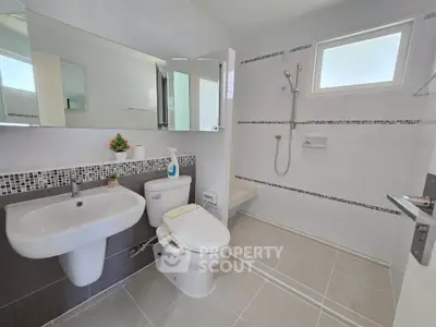 Modern bathroom with sleek fixtures and stylish tile design
