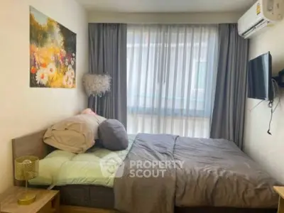 Cozy bedroom with modern decor and natural light