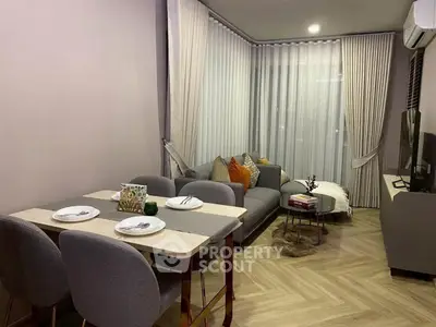 Modern living room with stylish decor and cozy dining area