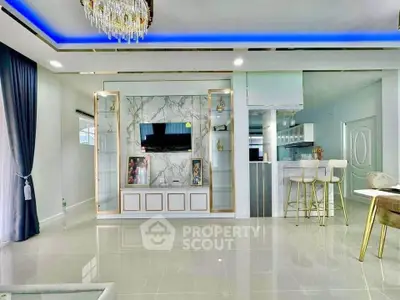 Luxurious modern living room with marble feature wall and elegant chandelier