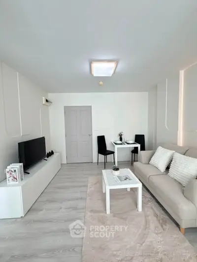 Modern living room with sleek furniture and minimalist decor